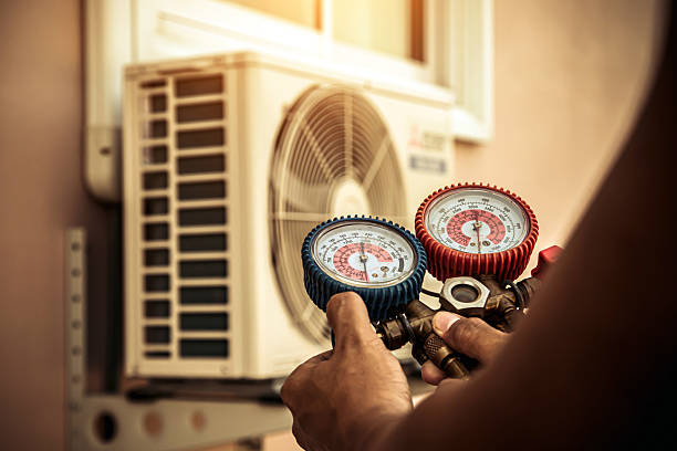 Professional Air Conditioning Service technician working in Central Bridge, NY